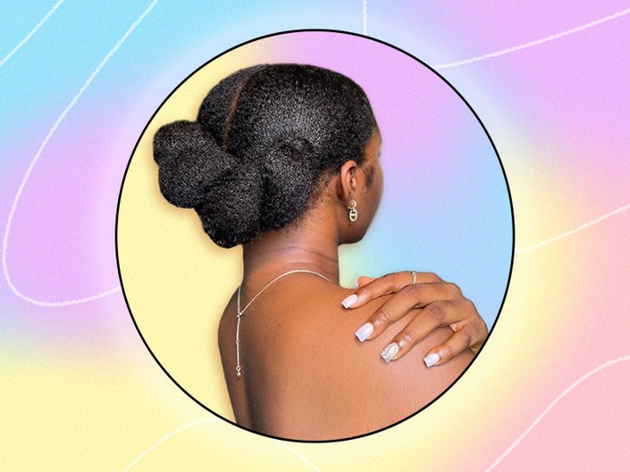 Picture of the back of a person’s curly hair updo on a graphic, pastel-colored background