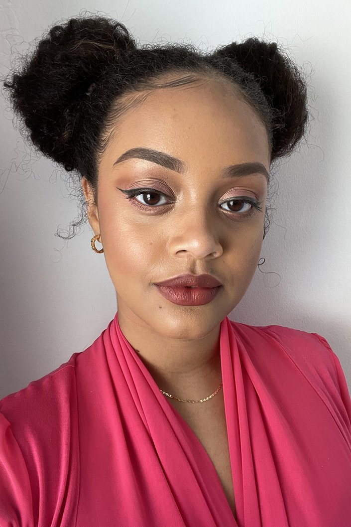 person wearing l'oreal paris les nus colour riche lipstick in nu extreme