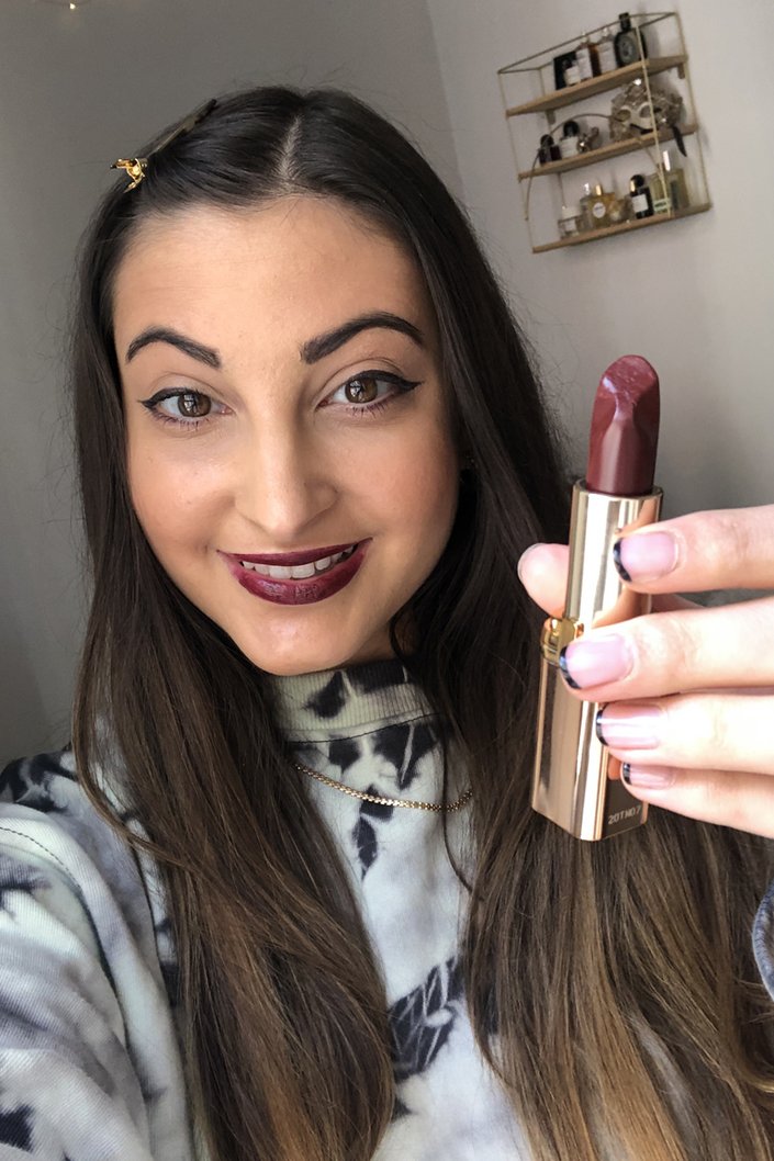 person wearing l'oreal paris les nus colour riche lipstick in nu artistique