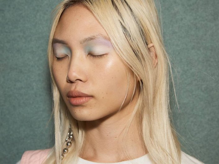 person wearing colorful pastel eyeshadow
