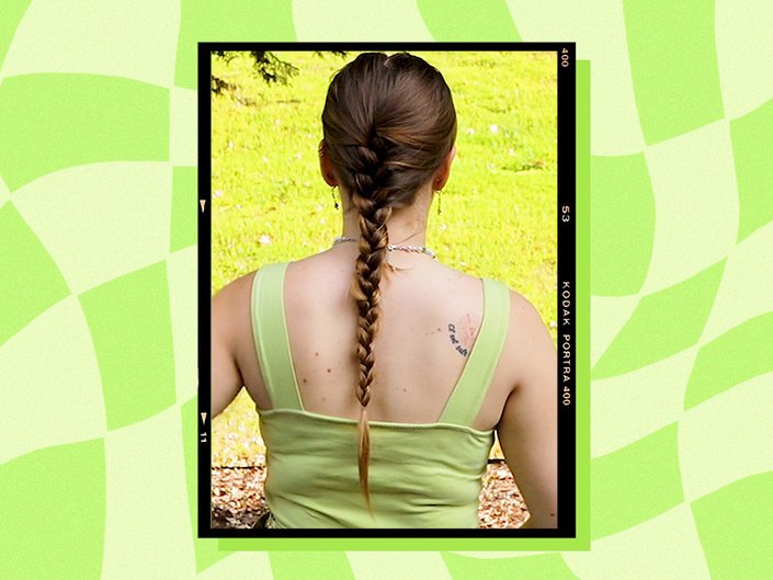 Photo of the back of a person's head with the hair in a French braid, collaged on a lime green graphic background