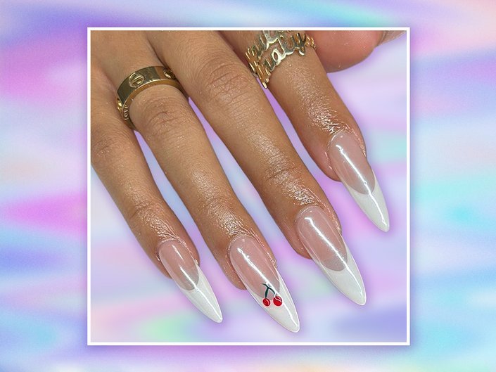 Picture of chrome French nails with a small cherry design on a multicolored, pastel graphic background