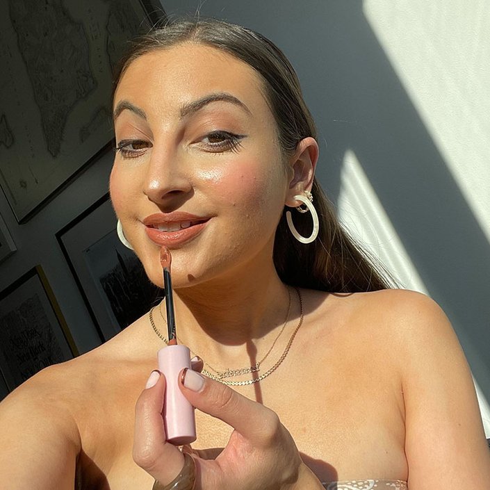 person wearing NYX Professional Makeup XXL Lip Lingerie Liquid Lipstick Fuego in Hot Carmelo