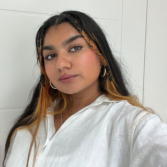 person wearing Lancôme L’Absolu Rouge Cream Lipstick in 326 Coquette