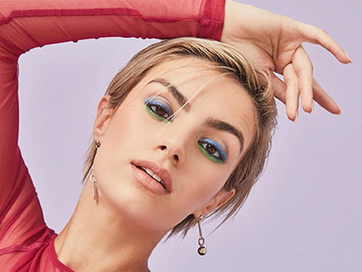 person wearing pastel egg-shaped eye makeup