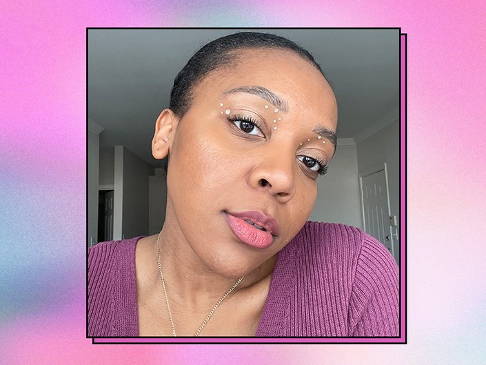 Editor with rhinestone makeup on a graphic background