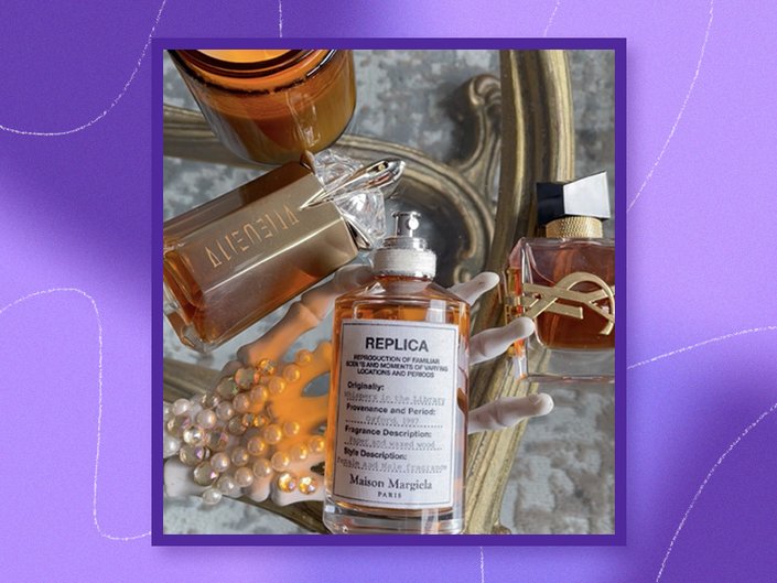 photo of witchy fragrances with skeleton hand and candle on a glass table